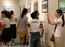 自治区博物馆展出广西残疾人书画摄影作品展